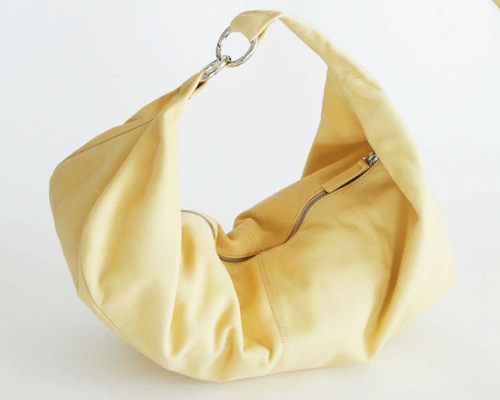 Diseño y fabricación de bolsos Elegant Supreme. Diseño y fabricación de bolsos Elegant Supreme. Bolso amarillo.