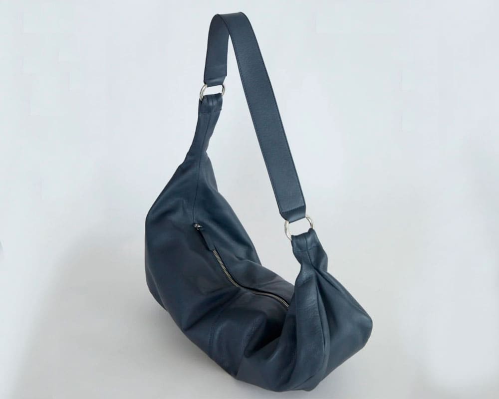 Elegant Supreme bolsos. Elegant Supreme, bolso azul. Cada producto que sale de nuestras líneas de producción nace de un proceso colaborativo y meticuloso.